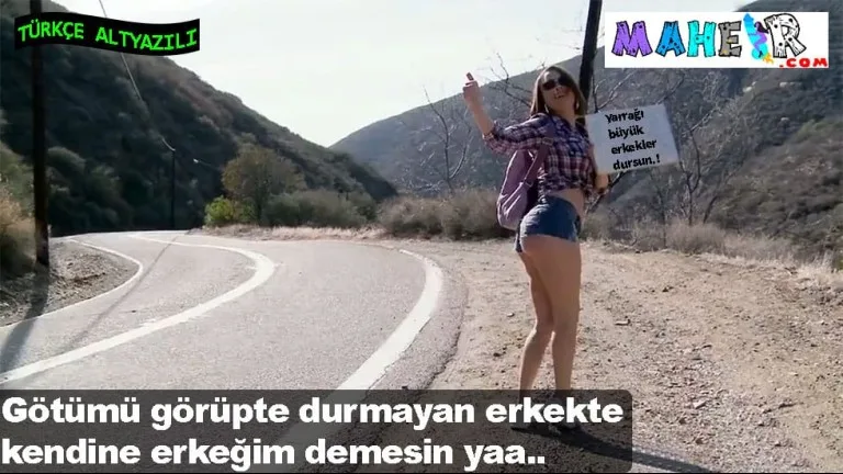 kalcalarini gostererek otostop ceken kasar.jpg