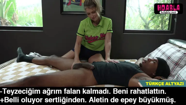 dul kadin oglunun arkadasinin kasiklarini ovalarken kalkan yarragi gordu.jpg